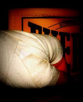 left hand and heavy bag