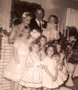 My parents on their wedding day surrounded by a host of nieces and my mother's little sister, my precious Aunt Judy.